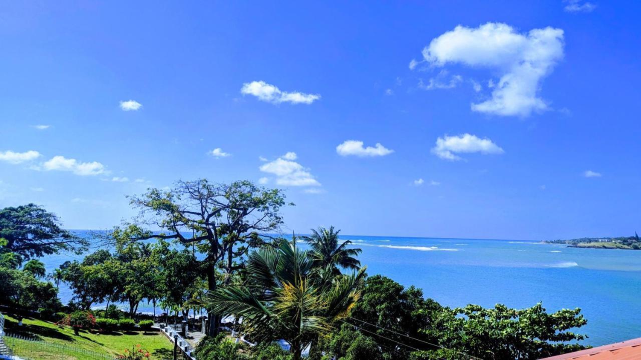 Sunset Lane Hotel Laborie Bagian luar foto