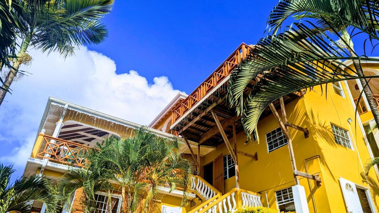 Sunset Lane Hotel Laborie Bagian luar foto